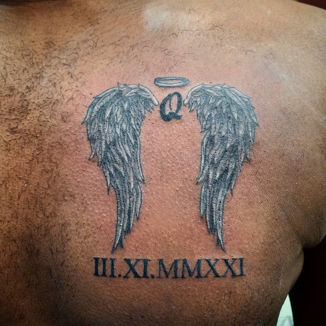 Wings Roman Numerals Dedicated Tattoo