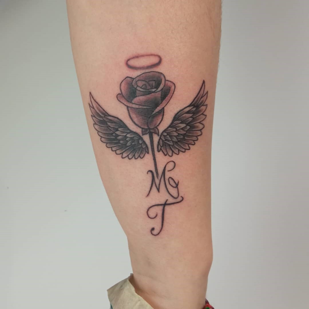 Wings Tattoos Design With A Rose Tattoo