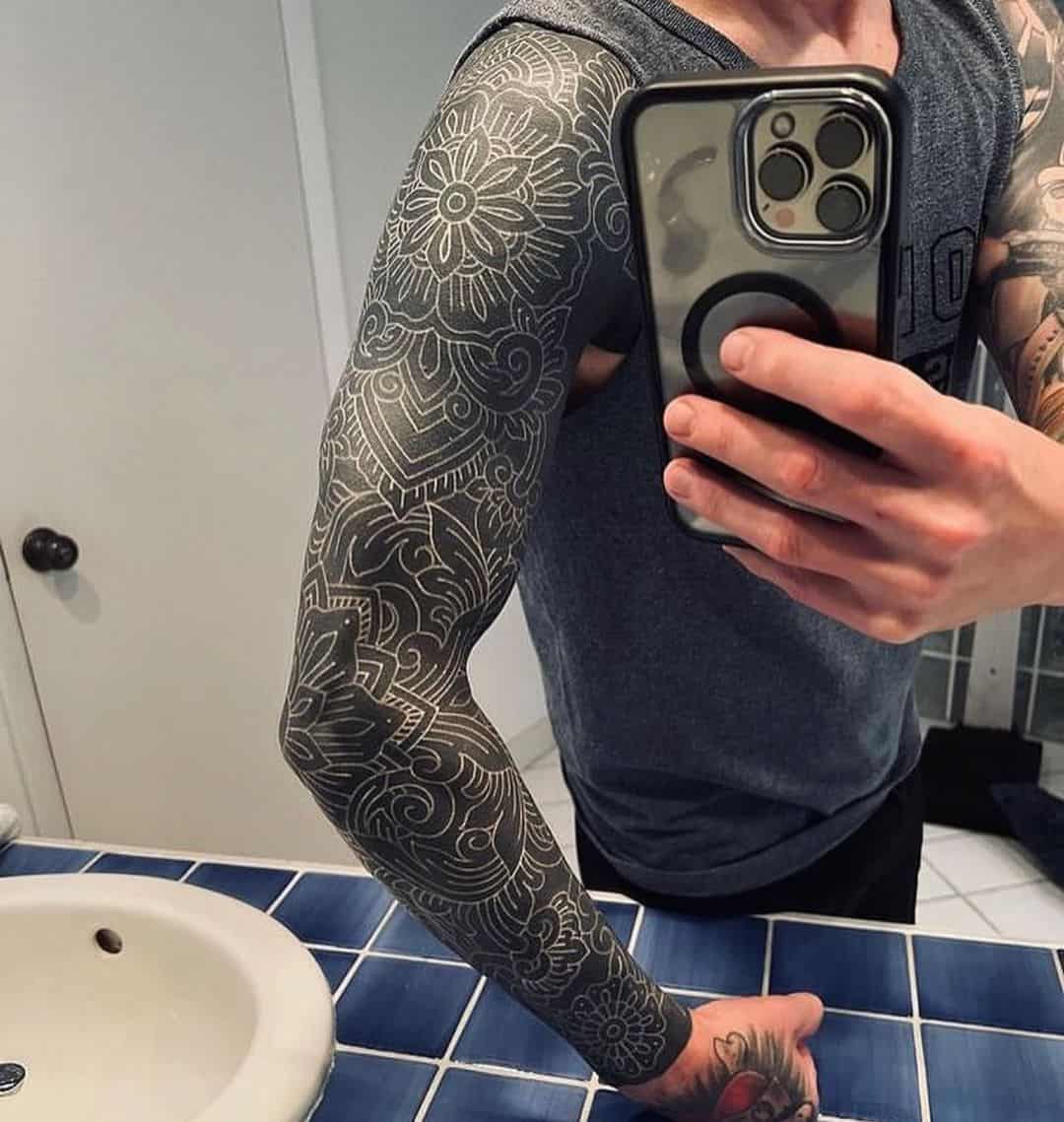 Looking for ideas for a white ink sleeve on top of my black out   rTattooDesigns