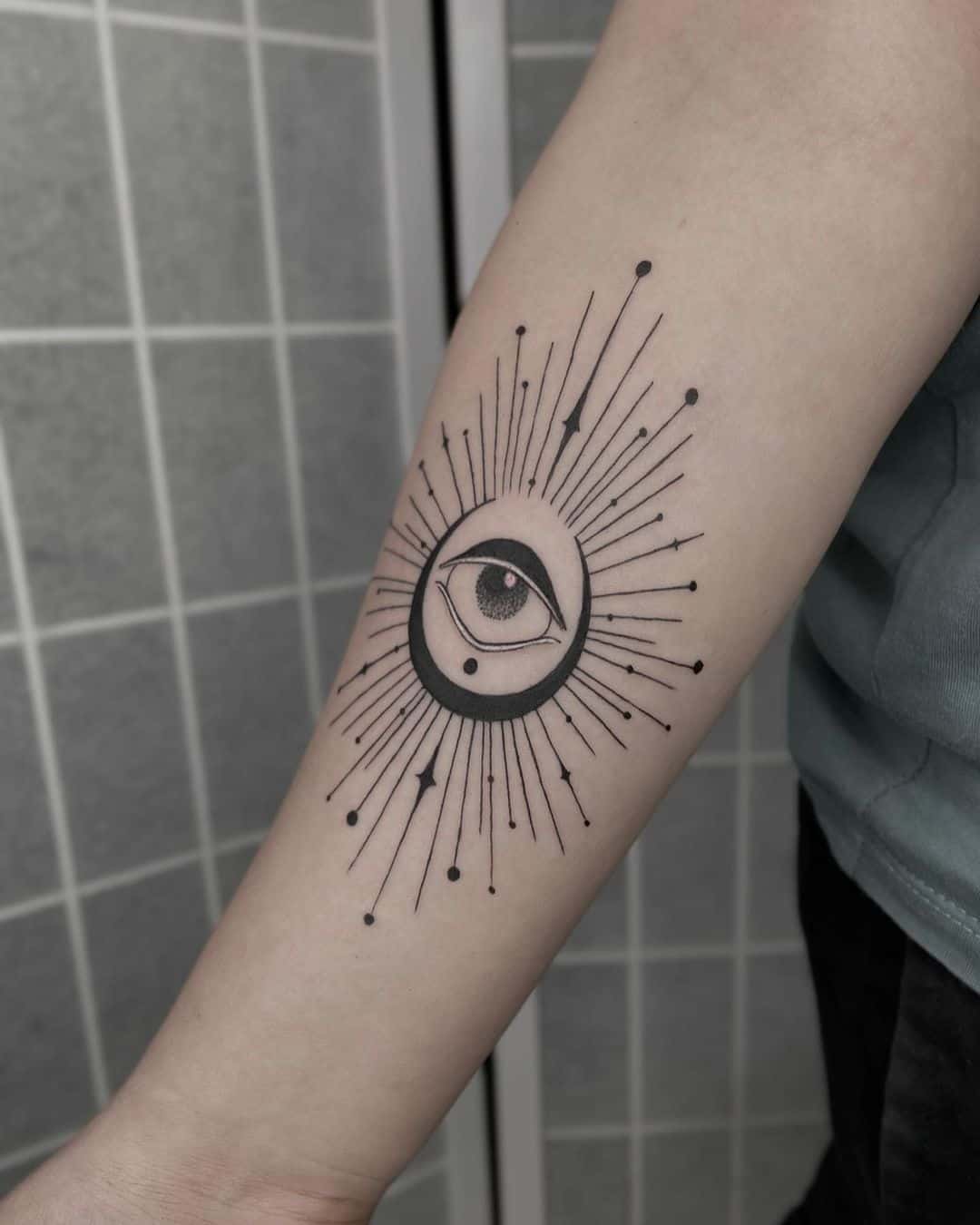 Crescent Moon With An Eye Tattoo