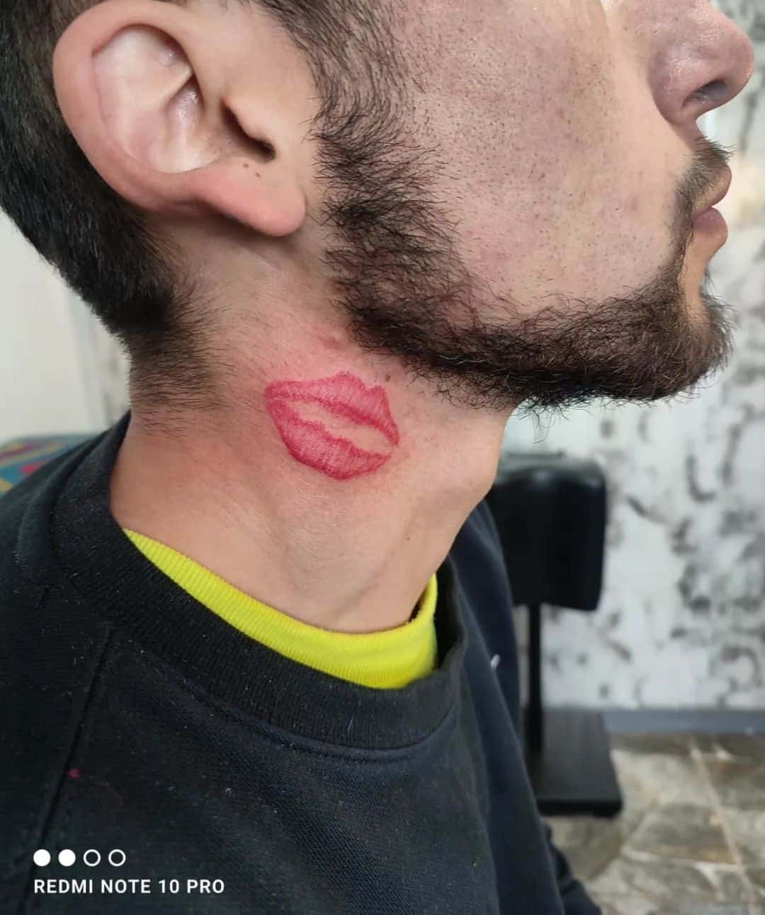 Lips Tattoo on The Neck men