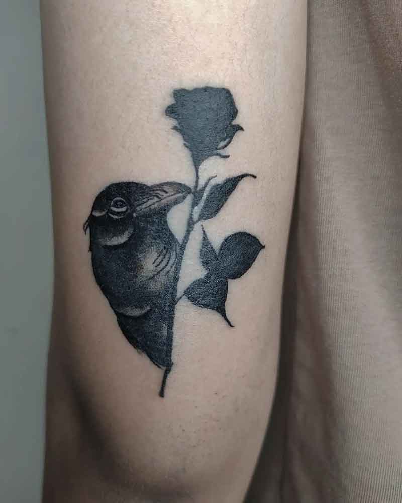 Black Rose and a Raven Tattoo